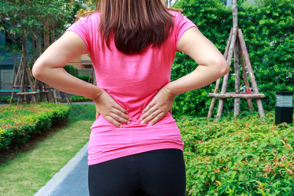 Woman with back pain.